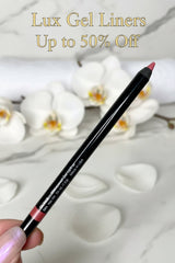 A close-up image of a waterproof gel lip liner pencil in Guava