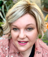 pink flirt lipstick on woman in pink jacket
