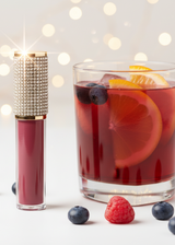 Sangria matte lipstick and a glass of sangria