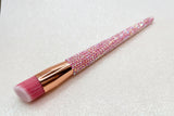 Stippling Makeup brush with pink bristles and a pink rhinestone handle on a sparkly background by La Paz Cosmetics