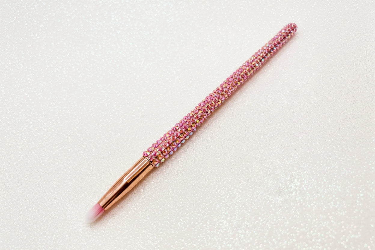 Pink Bling Eyeliner or Brow Brush with a full pink crystal handle and rose gold ferrule by La Paz Cosmetics on a white background 