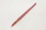 Pink Bling Eyeliner or Brow Brush with a full pink crystal handle and rose gold ferrule by La Paz Cosmetics on a white background 