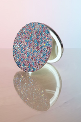 The ultimate luxury for your purse or vanity! Rechargeable LED compact mirror 1X &12X in pink, blue and white