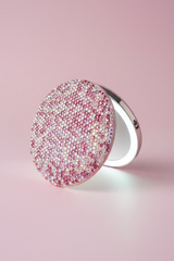 The ultimate luxury for your purse or vanity! Rechargeable LED compact mirror 1X &12X In Pink & white