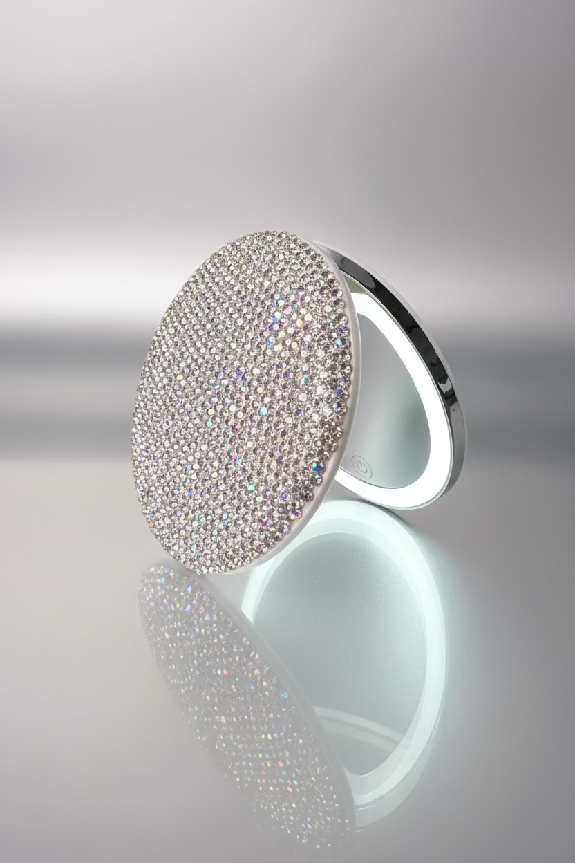 The ultimate luxury for your purse or vanity! Rechargeable LED compact mirror 1X &12X In White Crystal