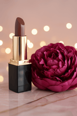L'Paige Chocolate Raspberry Mousse color-changing lipstick, transitions to shades of bright berry, presented by La Paz