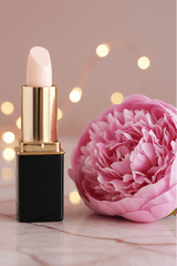 A tube of L'Paige brand lipstick in White Pink Coconut color changing shade with a pink peony.  Presented by La Paz Cosmetics