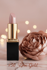 #56 Rose Gold L'Paige lipstick standing next to a large dusty rose decorative flower