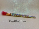 Round Blush Brush with a full aurora crystal handle, gold ferrule and pink bristles by La Paz Cosmetics on a white background 