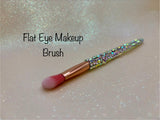 Flat Eye Makeup Brush with a full aurora crystal handle, gold ferrule and pink bristles by La Paz Cosmetics on a white background 