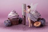 La Paz Crystal Frosting Lip Gloss Sugarplum Fairy —crystal tube with plum gloss, fairy figurine & purple cupcakes on lavender