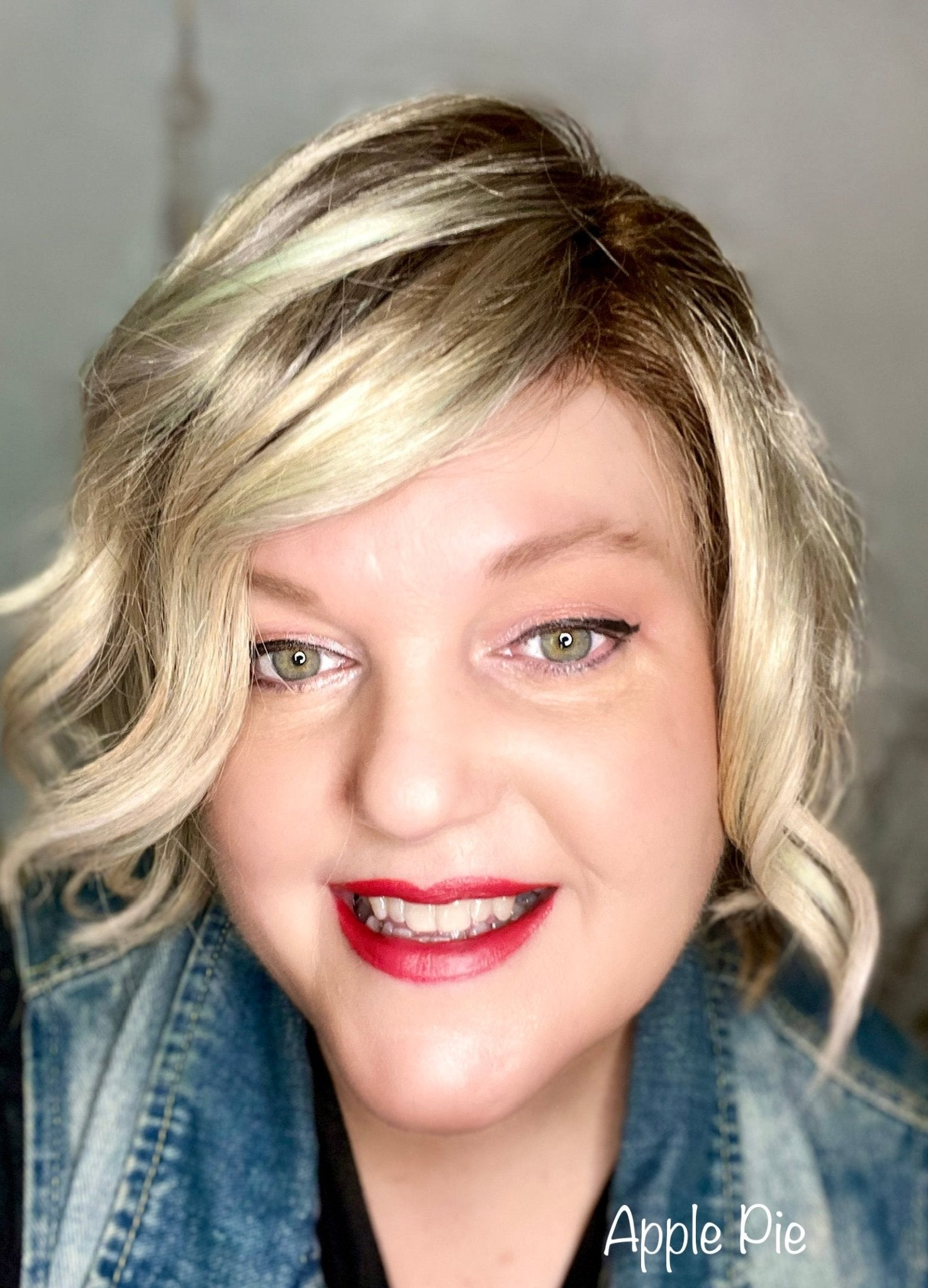 La Paz Cosmetics founder wearing M28 Apple Pie Diamond Liquid Matte Lipstick — a bold warm apple red matte shade