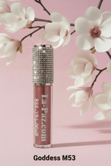 La Paz M53 Goddess Diamond Liquid Matte Lipstick — rhinestone cap with nude rose shimmer among magnolia blossoms on pink