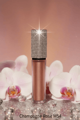 La Paz M54 Champagne Rosé Diamond Liquid Matte Lipstick — rhinestone cap, champagne flute & crystals on reflective surface