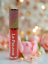 La Paz Sweet Peach Lux Lip Gloss — warm peach gloss with rainbow cap, blush roses & pearl beads with bokeh fairy lights