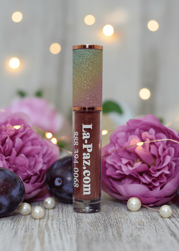 La Paz Plum Delicious Lux Lip Gloss — deep plum gloss with rainbow cap, purple roses, plums & pearl beads with bokeh lights