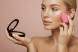 Compact of Creamy Beige foundation in a black case on a white background