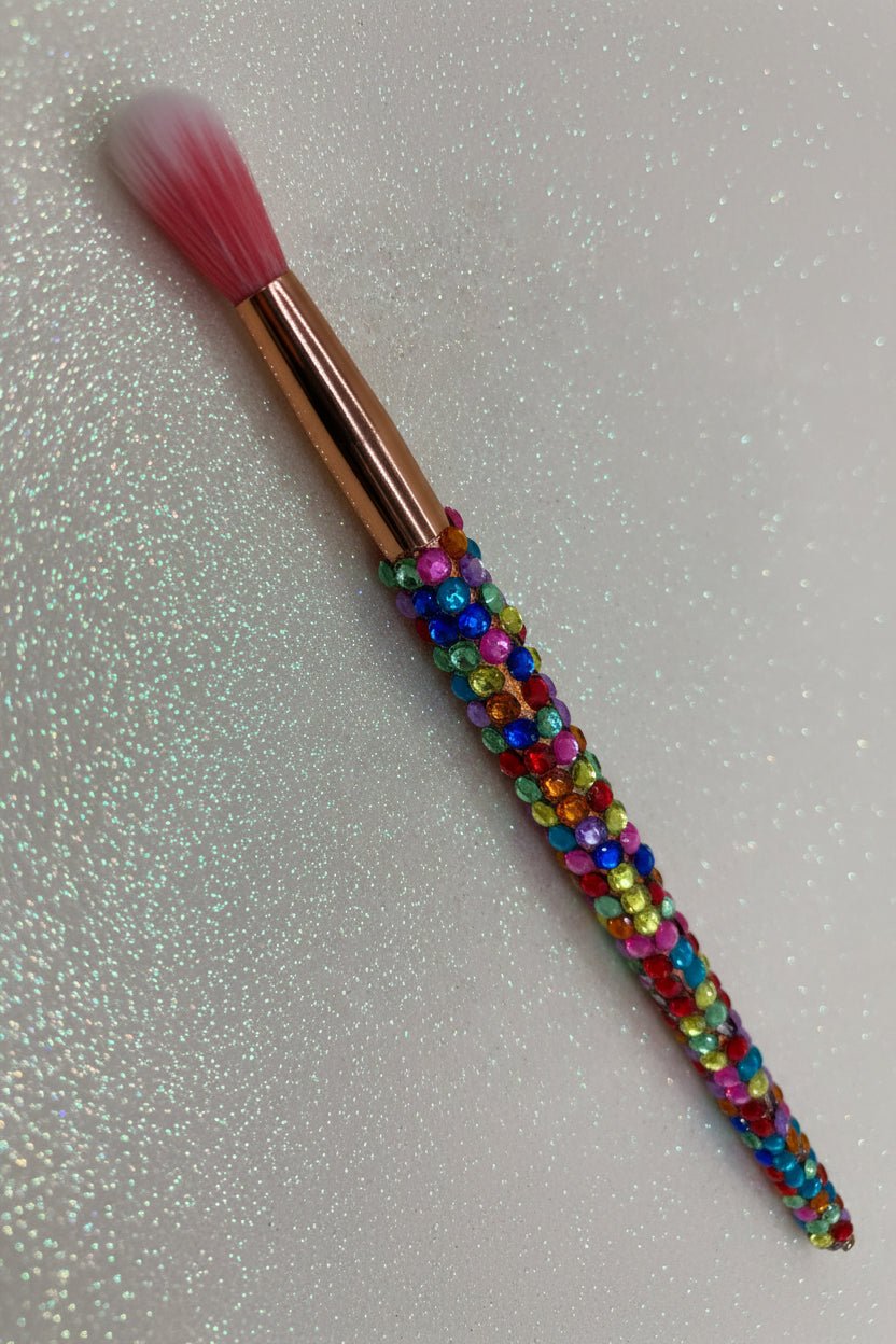 Rainbow  Bling Round Blending Round Eye Makeup Brush with a full multicolored crystal handle, gold ferrule and pink bristles by La Paz Cosmetics on a white background 