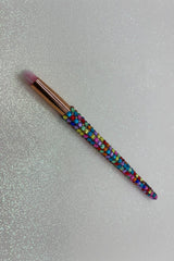 Rainbow  Bling Lip Brush with a full multicolored crystal handle, gold ferrule and pink bristles by La Paz Cosmetics on a white background 