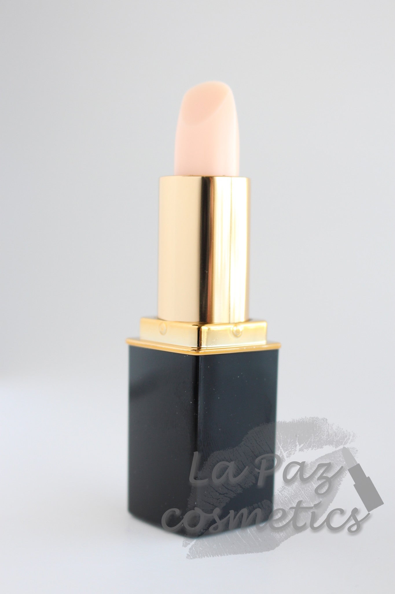 A tube of L'Paige brand lipstick in White Pink Coconut color changing shade, presented by La Paz Cosmetics